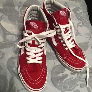 Size 8 (men’s) 9.5 (women’s) RED Sk8-Hi Vans.